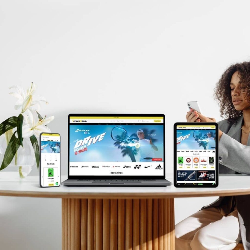 Work example for TennisMania project - different screen mockups on table with girl in the right background and plant in the left