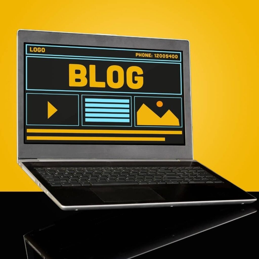 Androcraft blog writing service - floating laptop on table with yellow background